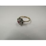 A dress ring with pink centre stone, stamped 37AR, size V