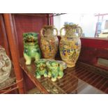 A pair of Oriental vases, three temple dogs and lidded dish (6)