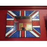 A wall hanging mirror with Union Jack surround, 48cm x 39cm