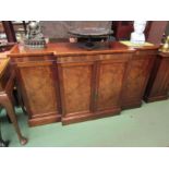 In the manner of Titchmarsh & Goodwin a crossbanded flame mahogany George III revival breakfront