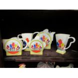 Clarice Cliff style ceramics made by Chelsea works Burslem including cups and teapot etc. (5)