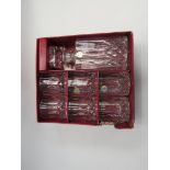 A boxed RCR crystal decanter and six glasses. Box a/f