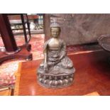 An early 20th century bronze seated Buddha 30.5cm high