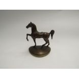 A 20th Century bronze horse, 12cm tall