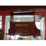 An Arts & Crafts Maple & Co. crossbanded mahogany wall hanging shelf/cabinet stamped 144 the