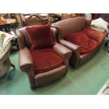 A brown leatherette sofa with two armchairs