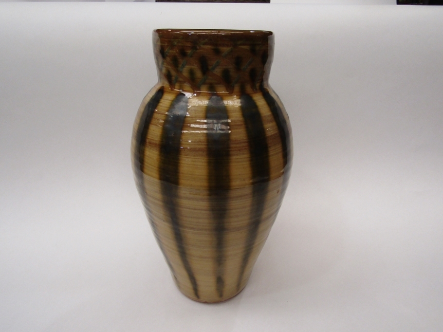 A Millgate Pottery slip vase in two tone brown decoration. 29cm tall x 15cm diameter