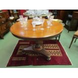 A Victorian mahogany breakfast table, turned column to triform plateau base, some losses, 91cm