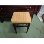 An Arts & Crafts line inlaid mahogany stool on brass capped feet