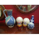 An isnik jug, a pair of mother-of-pearl balls, miniature vase, Oriental ceramics etc. (9)