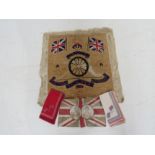 A Royal memorabilia wool tapestry with Latin text Union Jack flag and canon dated 1914 together with