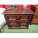 Circa 1700 an oak two section country cottage chest of three drawers the planked top and panelled