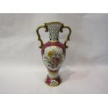 A Royal Dux Czechoslovakian pierced porcelain vase decorated with floral sprays. 29cm tall