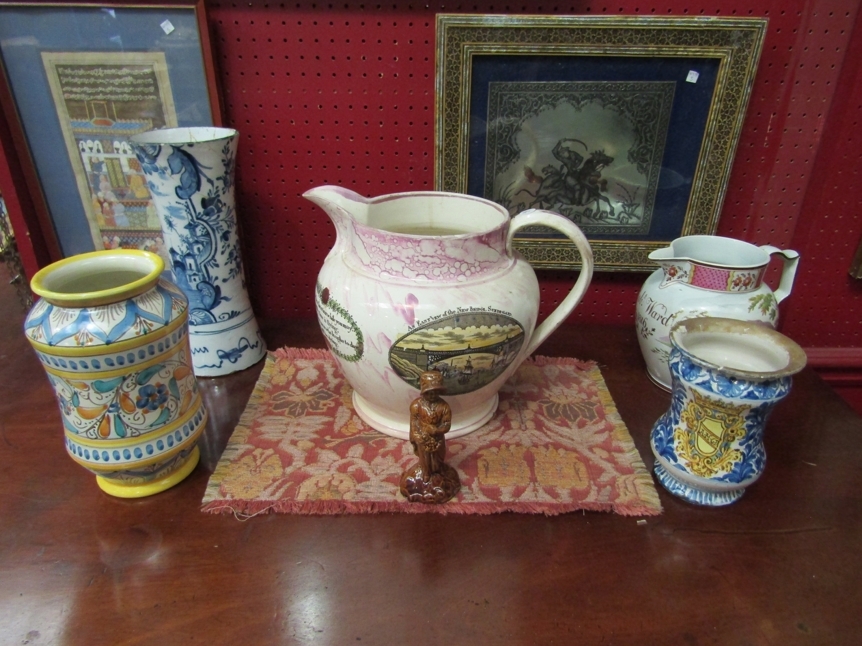 Six pieces of ceramics including a Sutherland lustre jug of large proportions decorated with The