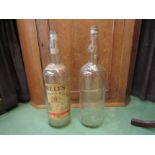 Two vintage Bell's Scotch Whiskey oversized bottles, approximately 51cm tall