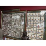 Three framed and glazed cigarette card displays including boxing personalities and R.A.F