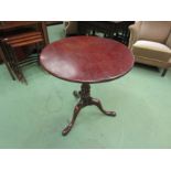 A George III revival mahogany revolving circular tilt-top wine table with birdcage action and turned