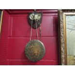 A wall hanging elephant design gong