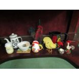 A chicken kitchen roll holder, Folklore 'Nina Jarema' enamel teapot, T.G Green yellow band salt