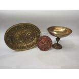 Three items possibly from a grand tour, an Italian brass plaque, 29cm wide, a French brass tazza and