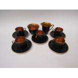 A Crown Devon Devon Fieldings black and gilt coffee part set