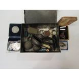 A bygone Oxo tin containing miscellaneous items including three small shot flints, inkwell in the