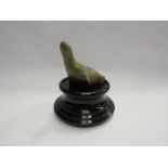 An Inuit soapstone carving "Seal at Play", carved to base E7-192, Napatchee b1918 Frobisher Bay (