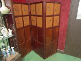 A mahogany three fold modesty screen with twenty four panels of Cecil Aldin prints depicting cats