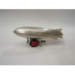 A clockwork aluminium model of a Graf Zeppelin 24cm long