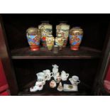 A selection of crested china, an early 20th century miniature vesta mug and three pairs of early