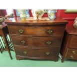 A Circa 1860 flame mahogany bow front chest of three graduating long drawers on bracket feet. 93.5cm