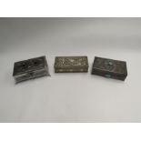 Three early 20th Century boxes- a pewter example with two turquoise coloured cabochons and two