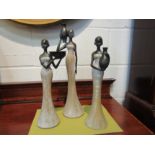 A set of three African female figures, tallest 41cm
