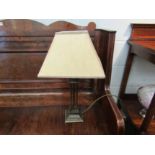 A Marks & Spencer column form table lamp with shade