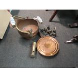 A copper coal scuttle with a heavy brass postbox money box, a metal ornament and bed warming pan (4)