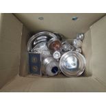 A box containing mixed plated wares including ice bucket, serving trays, bottle coasters