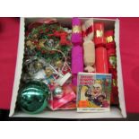 A part filled box of vintage Christmas crackers, bauble, a few decorations, etc.