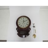 A 20th Century drop-dial wall clock by James Mackay, London, in a mahogany case. Restored. With