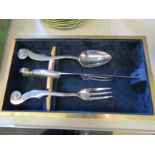 A limited edition cased knife, fork and spoon set, signed and stamped
