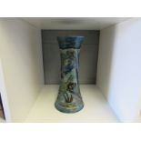 A Ch brannam tall waisted vase, relief moulded fish and weed in blue, green and brown glazes.