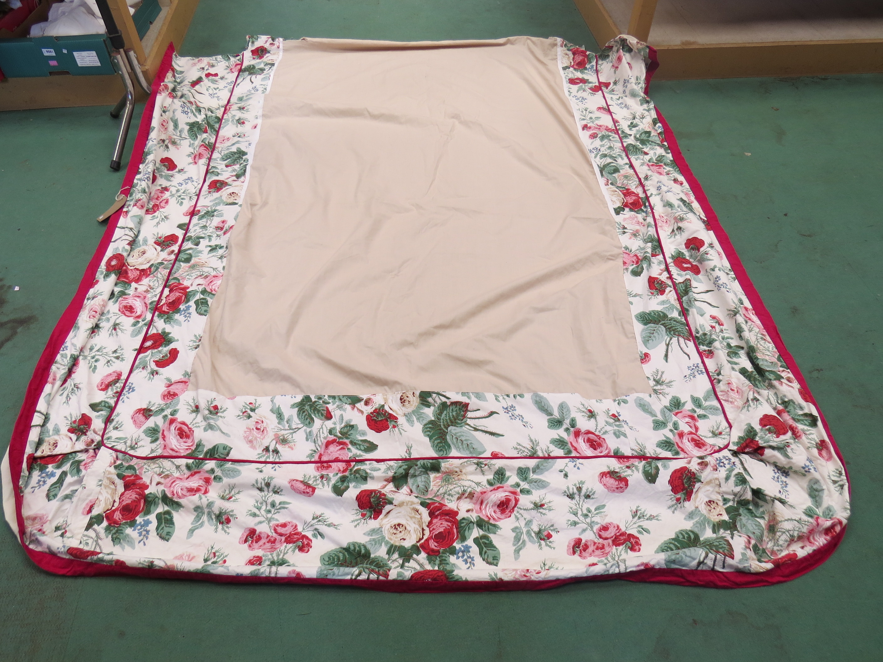 A country house bed valance, blousey flowers edged in red possibly Colefax and Fowler, single bed