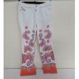 A pair of Diesel Industry Denim Division white trousers slightly flared hem, hippy floral style