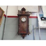 A Vienese mahogany cased wall clock