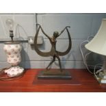 An Art Deco style bronze figure of a dancer mounted on marble, signed C. Mivval, 42cm tall