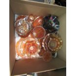 A box containing a quantity of carnival glass including vases, jugs, hors d'oeuvres dishes, sandwich