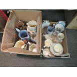 Two boxes containing commemorative jugs, harvest cups/mugs, etc. some a/f