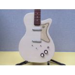 A Danelectro U2 electric guitar thought to be a later re-issue, no serial numbers visible aside from