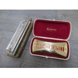 A Hohner Comet harmonica and a Hohner Chromonica III (2)