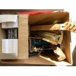 A box of mixed music equipment including Squier Telecaster neck, Numark DJ mixer and pedals etc