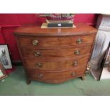 A Regency mahogany bow fronted chest of four graduating long drawers, brass handles, outswept